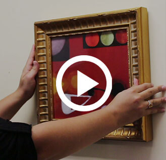 how to hang framed artwork