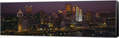 Framed High angle view of buildings lit up at night, Pittsburgh, Pennsylvania, USA Print