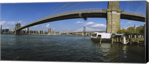 Framed Suspension bridge across a river, Brooklyn Bridge, East River, Manhattan, New York City, New York State, USA Print
