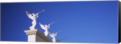 Framed Low angle view of statues on a wall, Caesars Place, Las Vegas, Nevada, USA Print