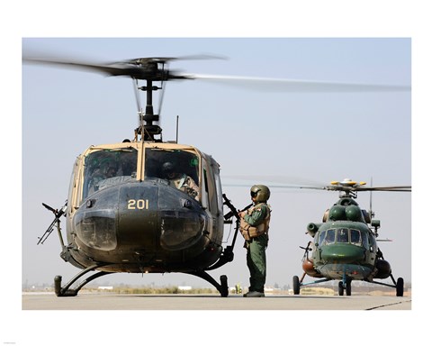 Framed Iraqi air force carries wounded warrior on aeromedical evacuation mission Print