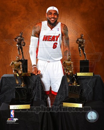 Framed LeBron James poses with his four MVP Trophies Print