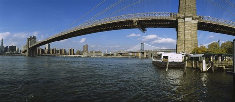 Framed Suspension bridge across a river, Brooklyn Bridge, East River, Manhattan, New York City, New York State, USA Print