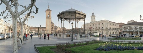 Framed Tourists in front of buildings, Plaza De Cervantes, Alcala De Henares, Madrid, Spain Print