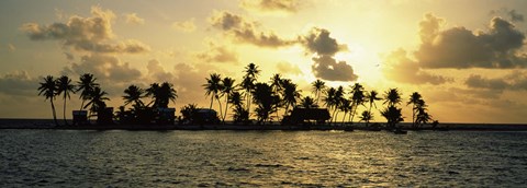 Framed Silhouette of palm trees on an island at sunset, Laughing Bird Caye, Victoria Channel, Belize Print