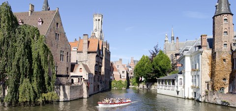 Framed Tourboat in a canal, Bruges, West Flanders, Belgium Print