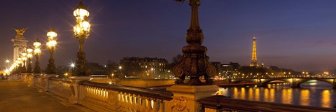 Framed Bridge across the river lit up at dusk, Pont Alexandre III, Seine River, Paris, Ile-De-France, France Print