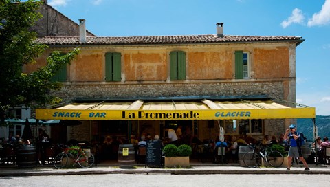 Framed Tourists at a restaurant, Avenue de la Promenade, Sault, Vaucluse, Provence-Alpes-Cote d&#39;Azur, France Print