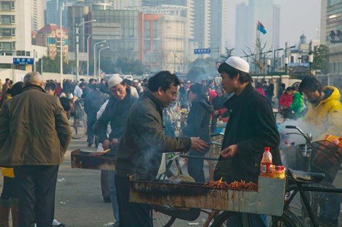 Framed Muslim Chinese Uyghur minority food vendors selling food in a street market, Pudong, Shanghai, China Print