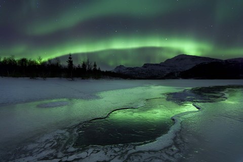 Framed Reflected aurora over a frozen Laksa Lake, Nordland, Norway Print