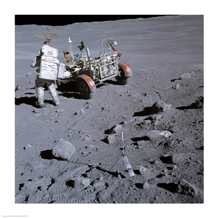 Framed Astronaut walking near the lunar rover on the moon, Apollo 16 Print