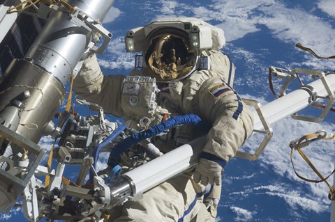 Framed Russian Cosmonaut Participates in a Session of Extravehicular Activity Print