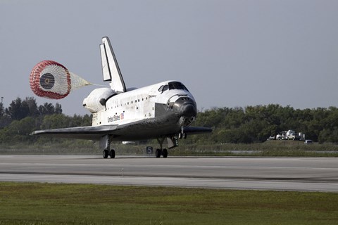 Framed With Drag Chute Unfurled, Space Shuttle Discovery Lands on Runway 33 Print