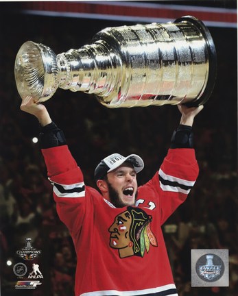 Framed Jonathan Toews with the Stanley Cup Game 6 of the 2015 Stanley Cup Finals Print