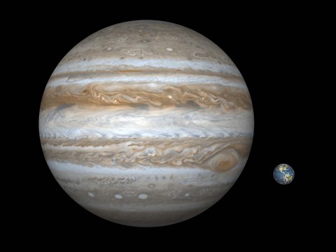 Framed Artist&#39;s concept Comparing the Size of the Gas Giant Jupiter with That of the Earth Print