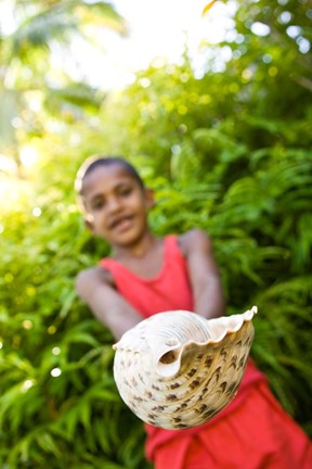 Framed Village boy with large sea shell, Beqa Island, Fiji Print