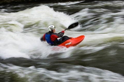 Framed Kayaker plays in a hole in Tariffville Gorge, Farmington River in Tariffville, Connecticut Print