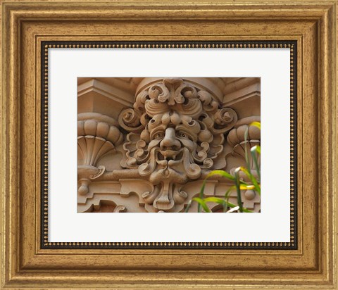 Framed Face In Stone On Buildings Wall Print