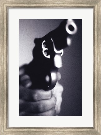 Framed Close-up of a person holding a handgun Print