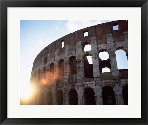Framed Low angle view of the old ruins of an amphitheater, Colosseum, Rome, Italy Print