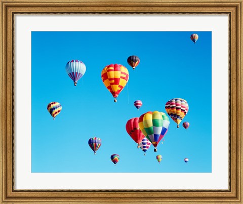 Framed Group of Hot Air Balloons Floating Together in Albuquerque, New Mexico Print