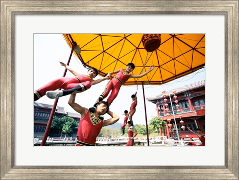 Framed Group of children performing acrobatics, Shanghai, China Print