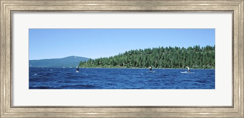 Framed Tourists paddle boarding in a lake, Lake Tahoe, California, USA Print