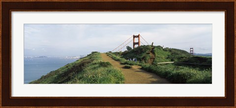 Framed Path leading towards a suspension bridge, Golden Gate Bridge, San Francisco, California, USA Print