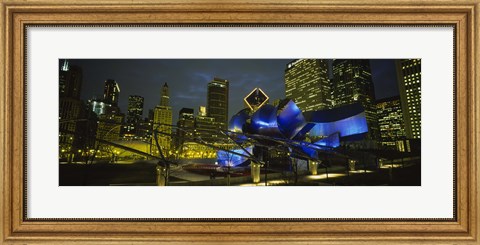 Framed Low angle view of buildings lit up at night, Pritzker Pavilion, Millennium Park, Chicago, Illinois, USA Print