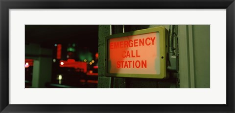 Framed Emergency telephone booth in a city, California, USA Print