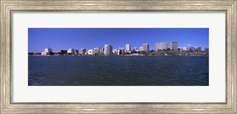 Framed Skyscrapers along a lake, Lake Merritt, Oakland, California, USA Print