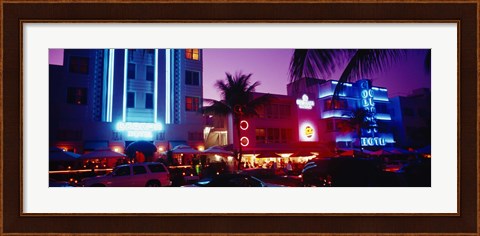 Framed Hotel lit up at night, Miami, Florida, USA Print