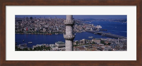 Framed Mid section view of a minaret with bridge across the bosphorus in the background, Istanbul, Turkey Print