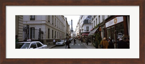 Framed Buildings along a street with a tower in the background, Rue Saint Dominique, Eiffel Tower, Paris, Ile-de-France, France Print