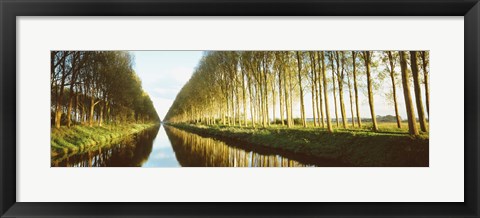 Framed Belgium, tree lined waterway through countryside Print