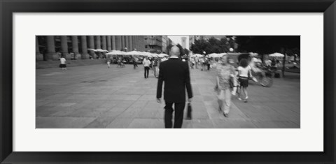 Framed Rear view of a businessman walking on the street, Stuttgart, Germany Print