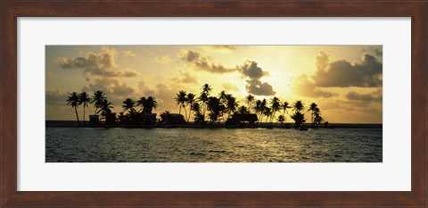 Framed Silhouette of palm trees on an island at sunset, Laughing Bird Caye, Victoria Channel, Belize Print
