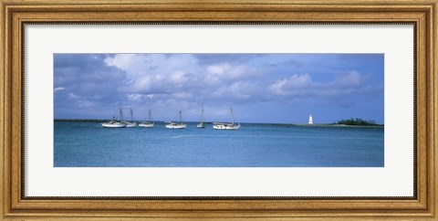 Framed Boats in the sea with a lighthouse in the background, Nassau Harbour Lighthouse, Nassau, Bahamas Print