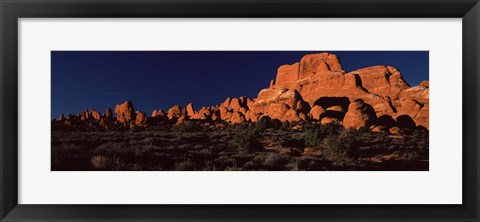 Framed Rock formations on an arid landscape, Arches National Park, Moab, Grand County, Utah, USA Print