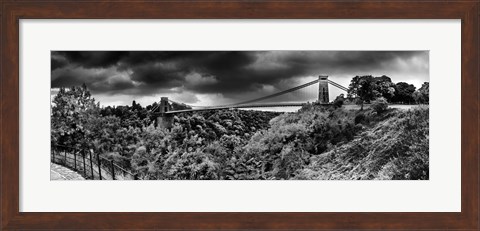 Framed Dark clouds over a suspension bridge, Clifton Suspension Bridge, Bristol, England Print