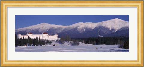 Framed Hotel near snow covered mountains, Mt. Washington Hotel Resort, Mount Washington, Bretton Woods, New Hampshire, USA Print