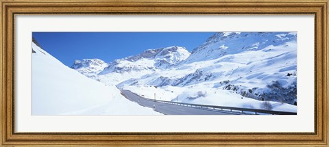 Framed Snow covered mountains on both sides of a road, St Moritz, Graubunden, Switzerland Print