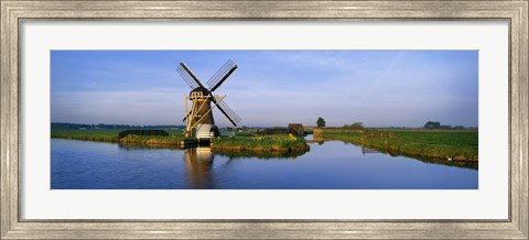 Framed Traditional Windmill On The Waterfront, Netherlands Print