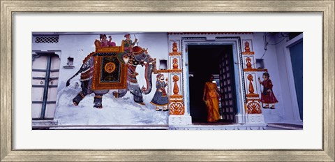 Framed Young woman standing at the door, Udaipur, Rajasthan, India Print