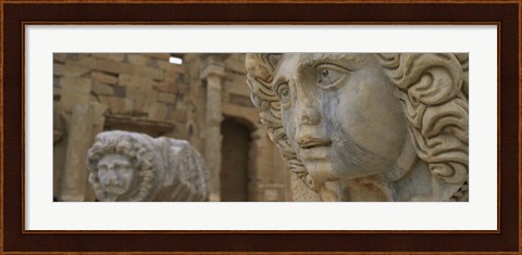 Framed Close-up of statues in an old ruined building, Leptis Magna, Libya Print