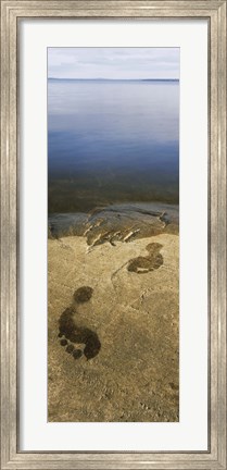 Framed High angle view of wet footprints on a rock, Lake Pielinen, Lieksa, Finland Print