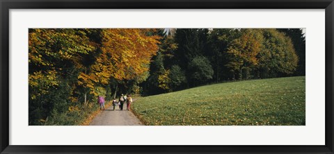 Framed Group of people walking on a walkway in a park, St. Peter, Black Forest, Baden-Wurttemberg, Germany Print