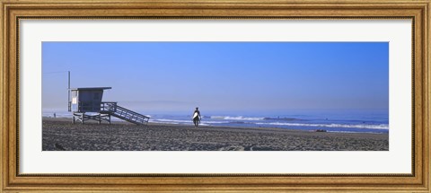 Framed Rear view of a surfer on the beach, Santa Monica, Los Angeles County, California, USA Print