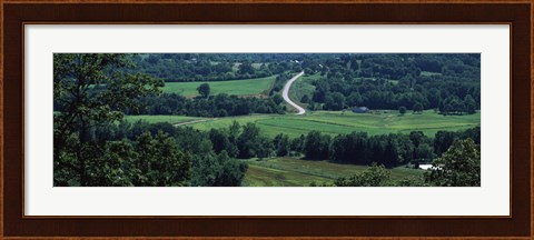 Framed Winding road passing through a landscape, East Central, Missouri, USA Print