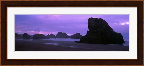 Framed Silhouette of rock formations in the sea against a pink sky, Myers Creek Beach, Oregon Print